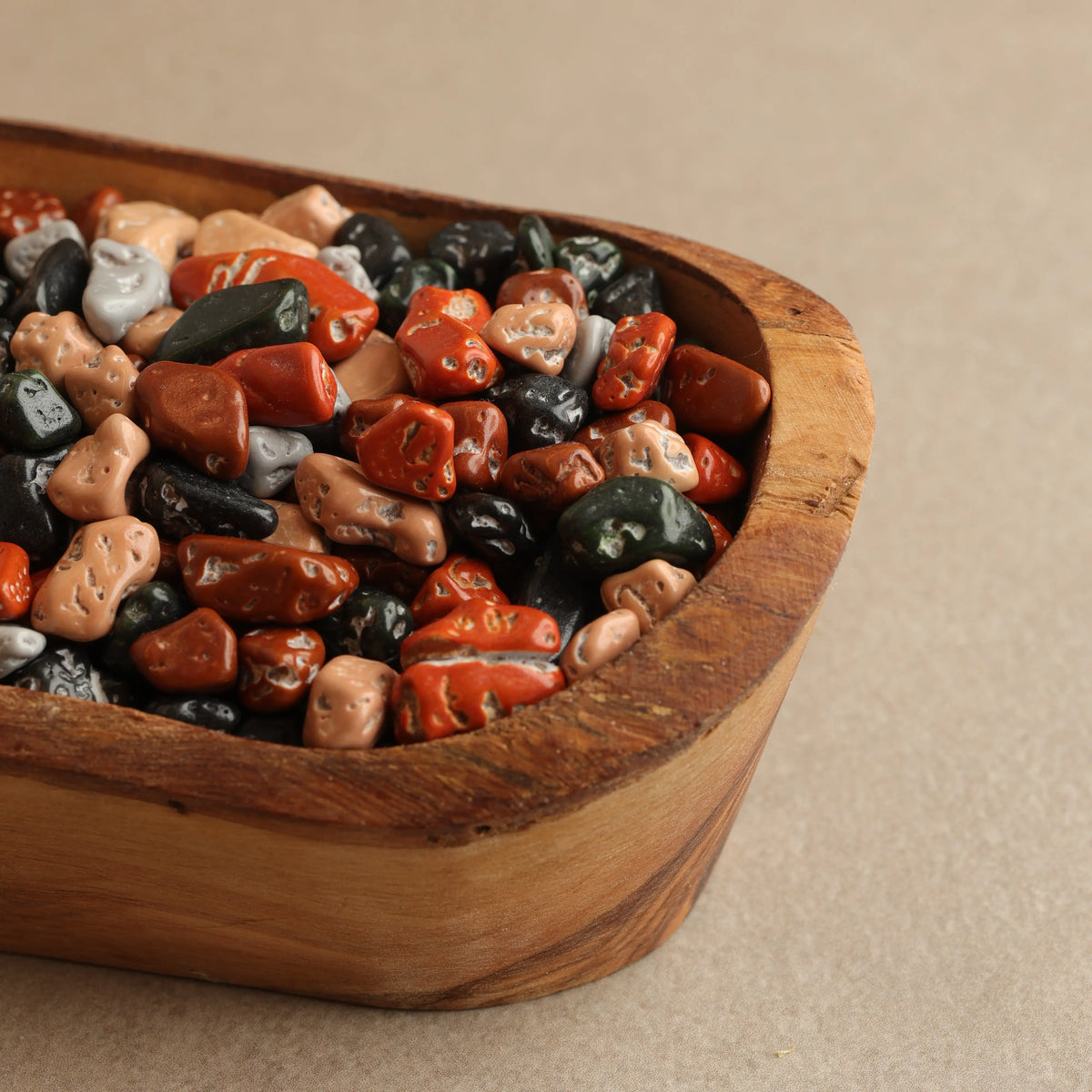 Colorful chocolate rocks made with milk chocolate and candy coating