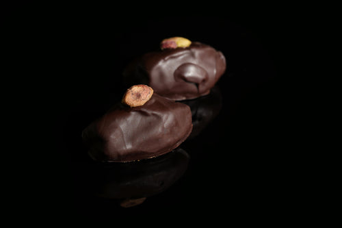 Khudri Date with Crunchy Pistachio Butter Coated in Dark Belgian Chocolate