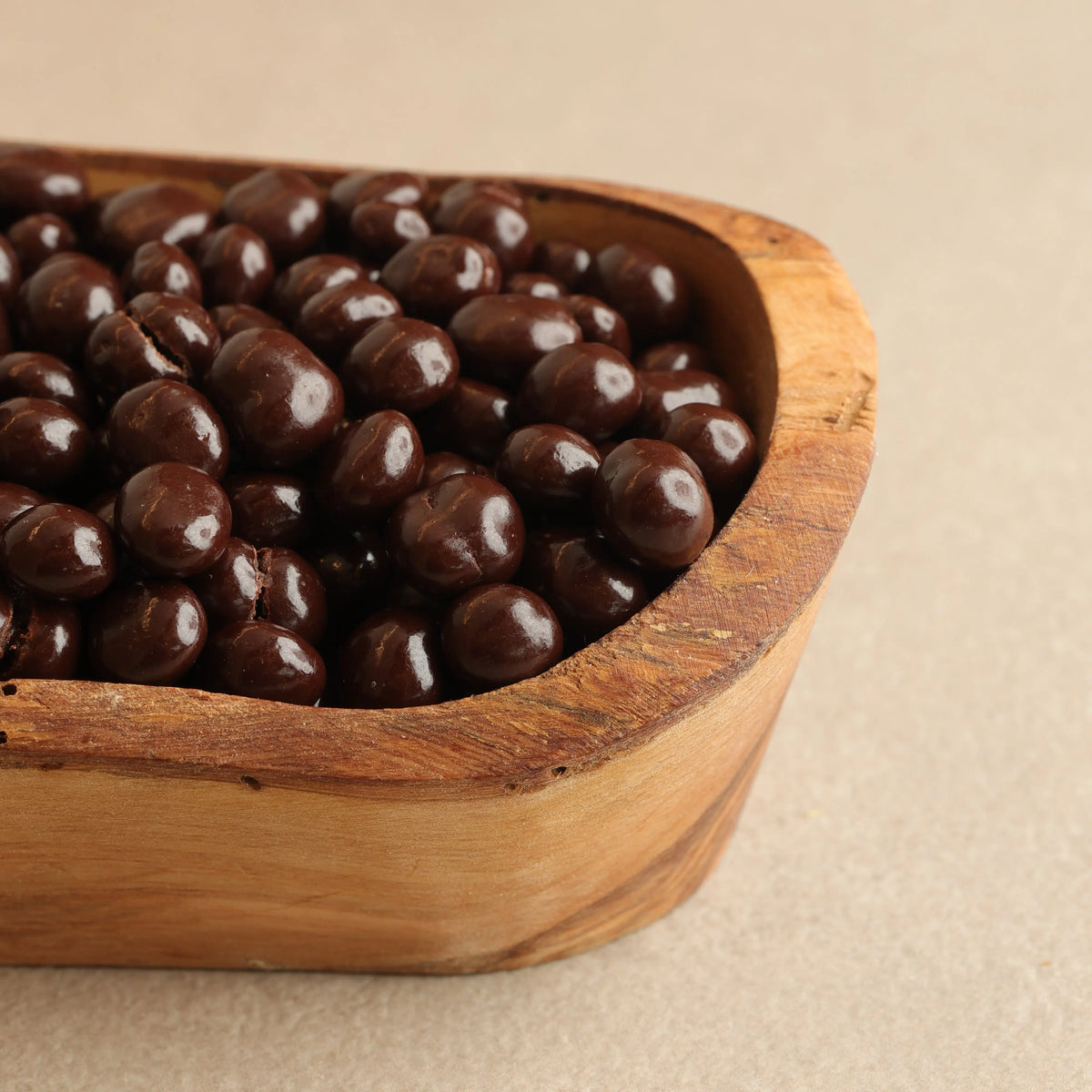 Whole pistachios covered in milk chocolate